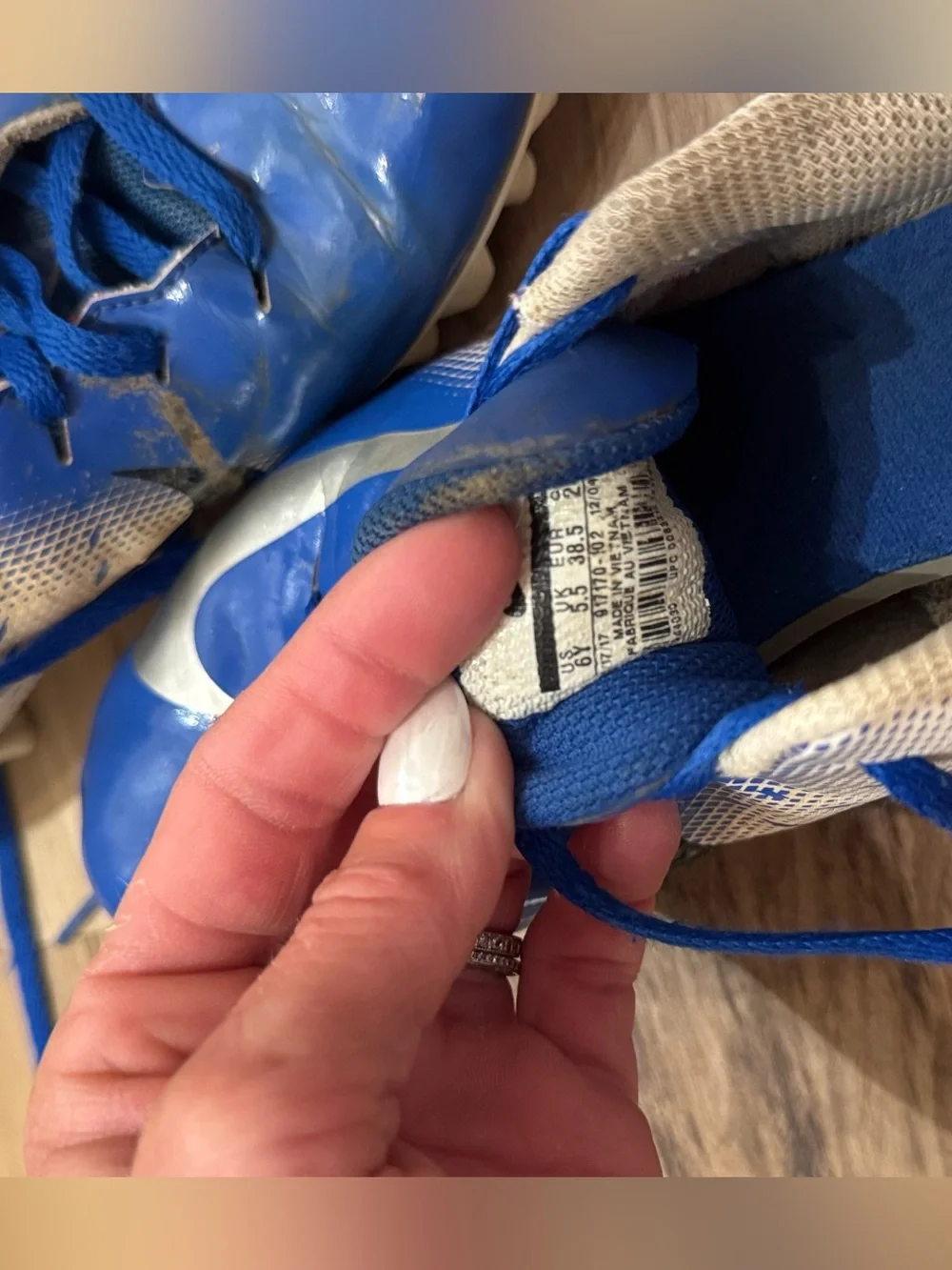 Nike Blue, White, and Black Kids football Cleats size 6